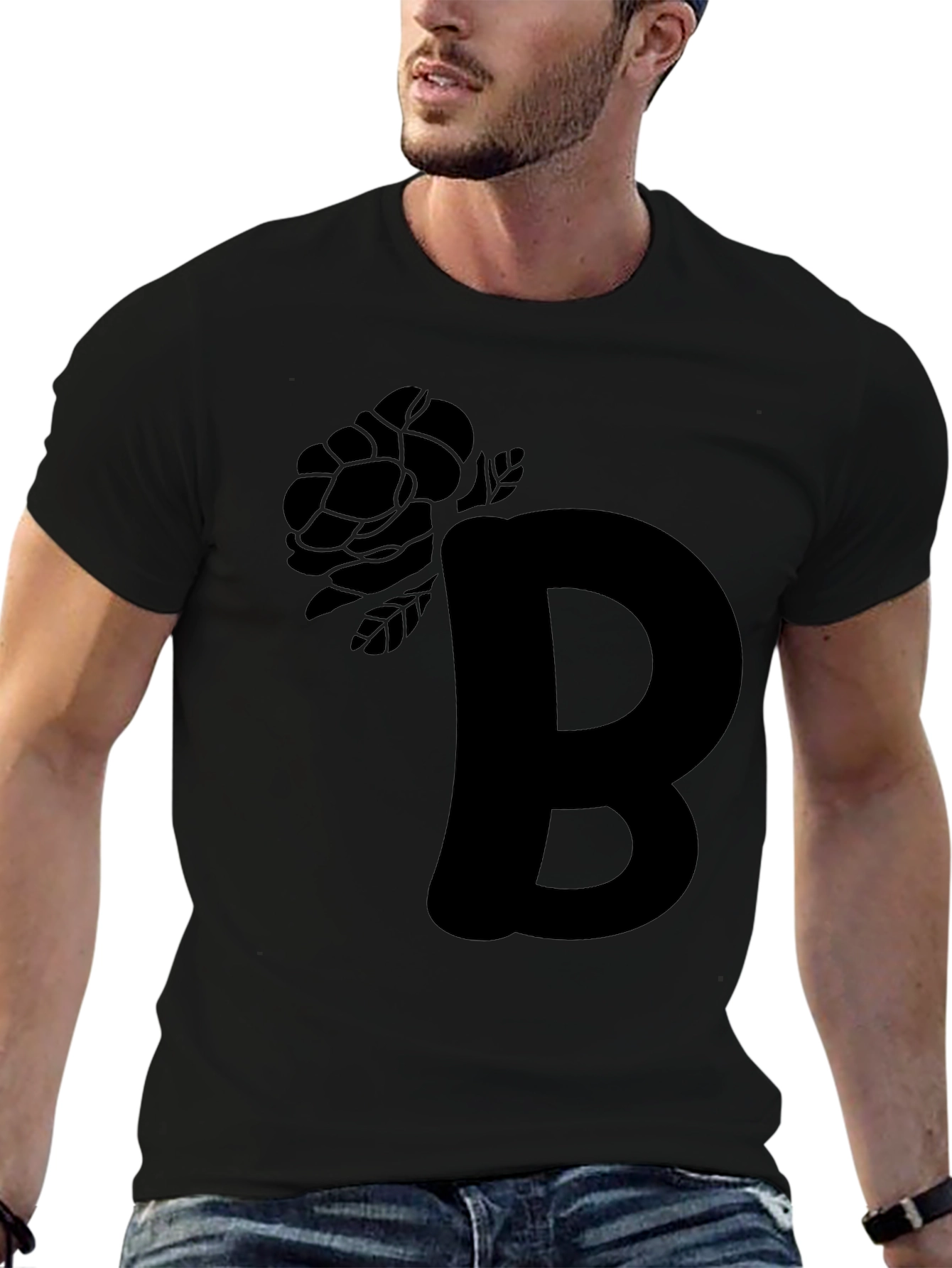 Camiseta Negra con Diseño de Letra y Rosa