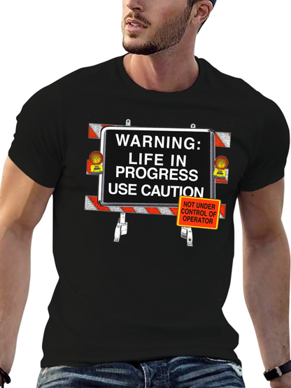Camiseta Negra: ¡Precaución Vida en Progreso!