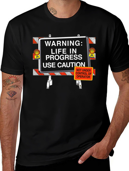 Camiseta Negra: ¡Precaución Vida en Progreso!