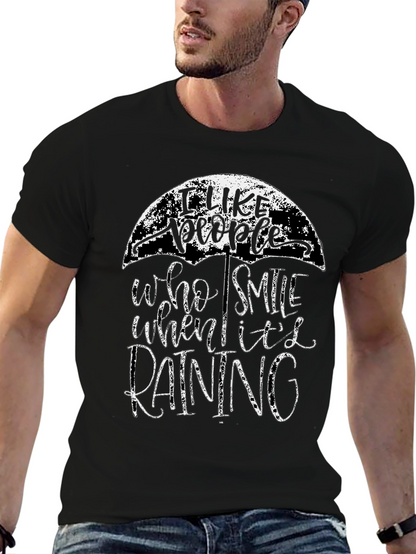 Camiseta Negra con Diseño de Paraguas y Frase Positiva
